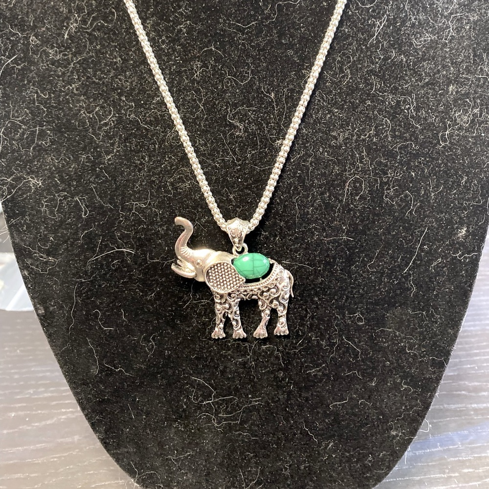 Silver tone and faux stone elephant necklace